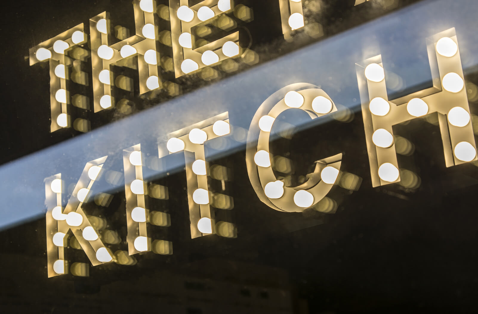 The Park Kitchen - small letters with light bulbs placed behind glass